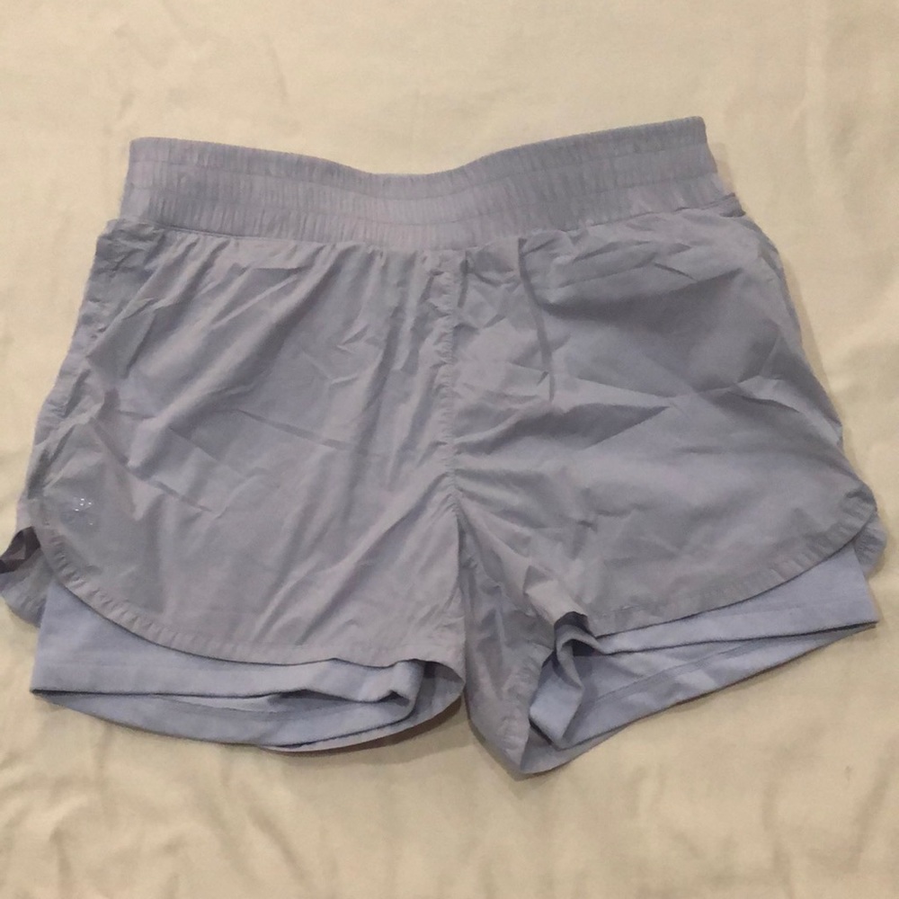 Athletes girl shorts. Bike shorts with overlay.